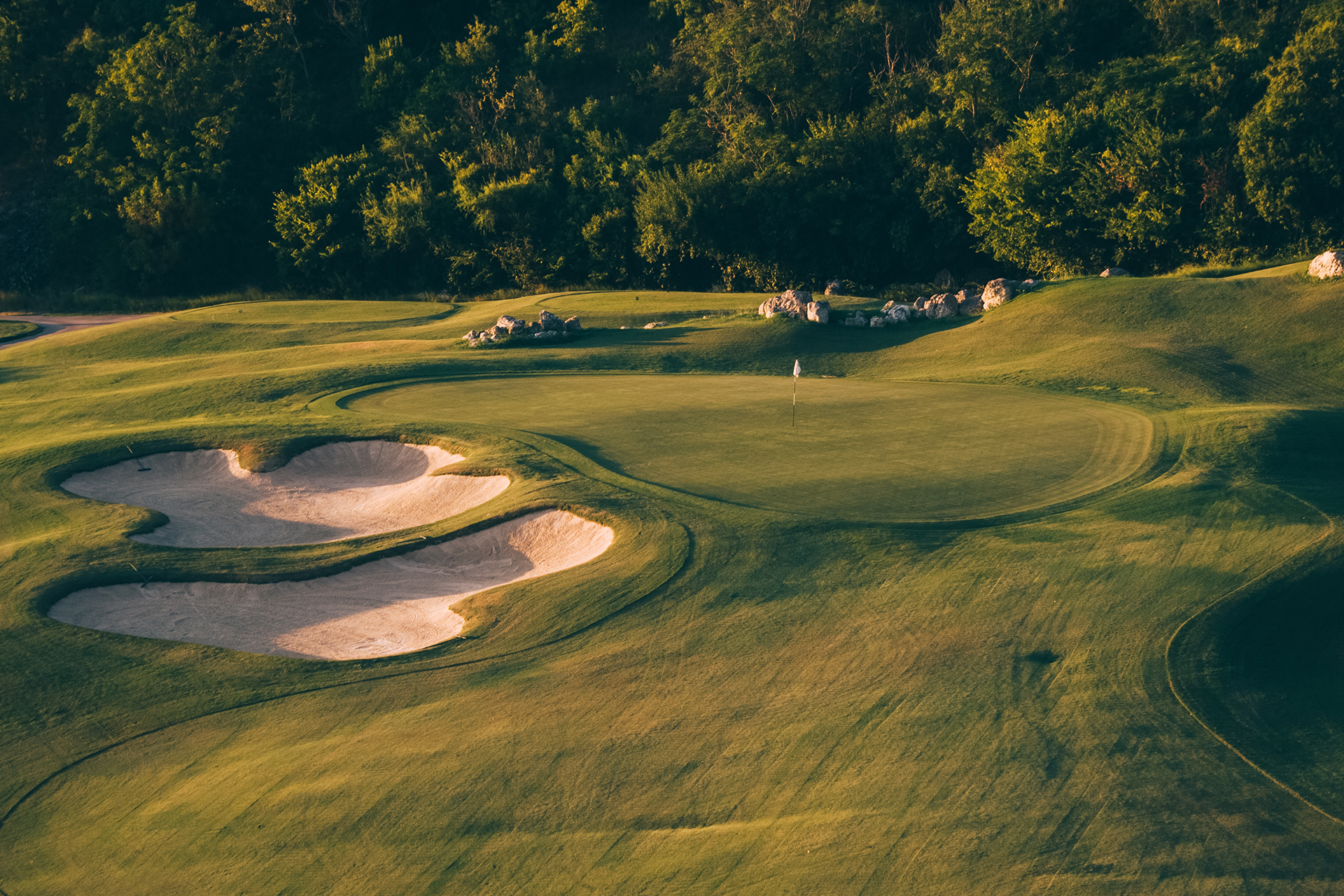 Championship green at sunset